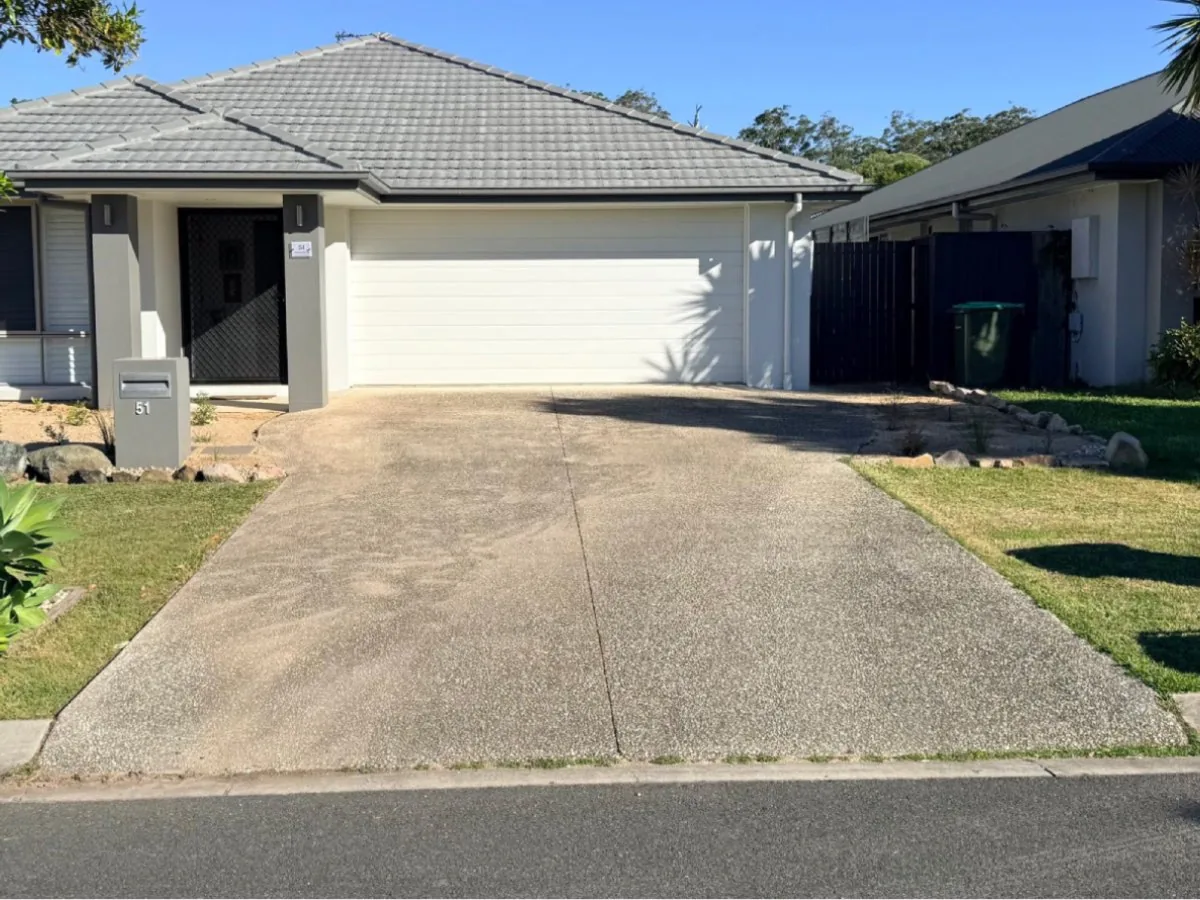 Exposed aggregate driveway in Buderim before pressure washing